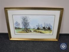 A gilt framed signed print,