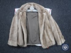 A blonde mink fur coat