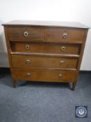 A Victorian inlaid mahogany five drawer chest