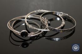 Three sterling silver and two white metal bangles (5)