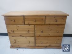 A pine seven drawer chest