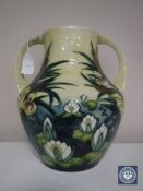 A Moorcroft Bull Rush design twin-handled vase height,