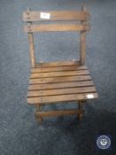 A mid 20th century folding child's chair