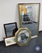 A gilt framed bevelled overmantel mirror together with an octagonal brass framed mirror,