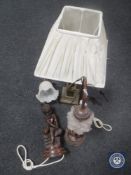 Two contemporary cherub table lamps with glass shades together with a brass Corinthian column table