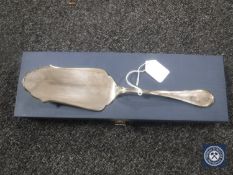 A Greggio Continental silver slice, 141.1g, in retail box.