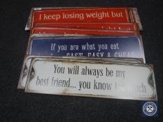 Seventeen assorted metal signs and one wooden sign