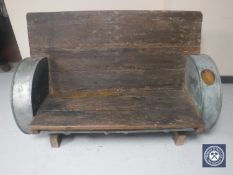 A bespoke oil drum and wood garden bench