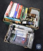 Two boxes containing Newcastle United cup final programmes, books relating to football,