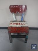 An oil drum dining chair