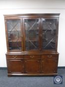 A Regency style triple door display cabinet