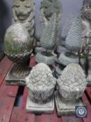 Seven concrete finials