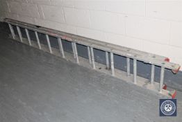 An aluminium extension ladder