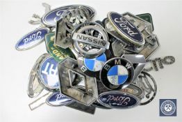 A box of various car badges (Qty)