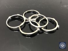 An 18ct white gold puzzle ring