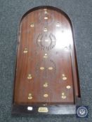 An Amersham Scora bagatelle board