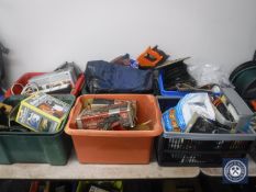 Six plastic crates of assorted hand tools, power tools, hardware,