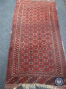 A fringed Afghan Tekke rug