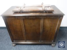 An oak blanket chest and a clothes press