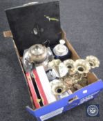 A box of seven-way plated epergne, teapot, Wedgwood table lighter, cased cutlery,