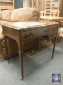 A late Victorian inlaid mahogany lady's writing desk fitted with three drawers, width 84 cm.