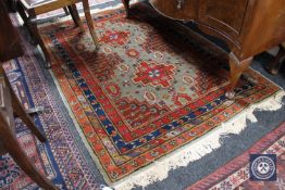 A Caucasian design rug,