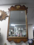 A 19th century walnut and parcel gilt Chippendale style mirror