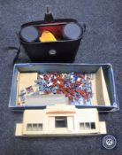 A boxed Hornby Dublo drive through station together with a small quantity of miniature plastic