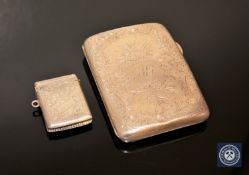 A silver cigarette case and a silver vesta