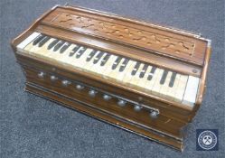 A mid 20th century table top mini organ