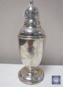 A silver sugar sifter,