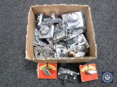 A box containing coin machine operating mechanisms