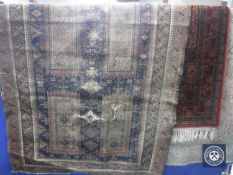Three antique Persian rugs