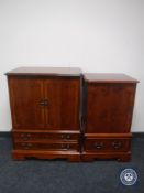 A yew wood TV cabinet with matching hi/fi cabinet