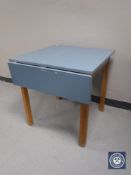 A mid 20th century melamine topped kitchen table