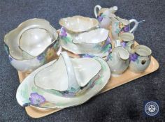 A tray of twelve pieces of Maling green floral lustre china