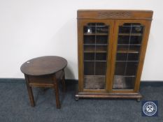 An oak leaded door bookcase and an oak sewing box