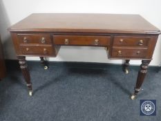 An early Victorian mahogany writing table
