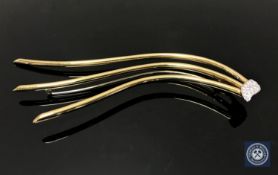 An 18ct gold diamond set hair ornament,