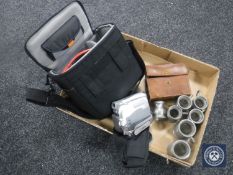 A box of eight antique pewter tankards, pair of early 20th century leather cased glasses,