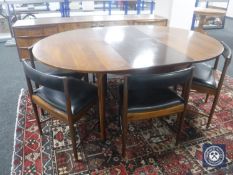 A mid 20th century McIntosh eight-piece dining room suite