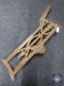Two Victorian cast iron seat ends