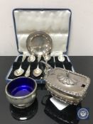 A silver salt, ashtray,