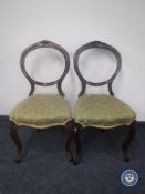 A pair of Victorian dining chairs