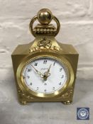 An ornate brass Angelus Carillon desk clock