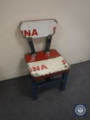 An oil drum dining chair