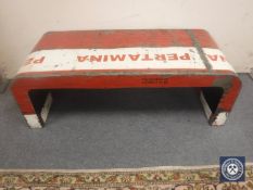 An oil drum coffee table