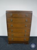 A mid 20th century oak six drawer chest