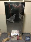 A contemporary metal water feature with pump