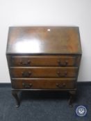 A 20th century Queen Anne style bureau